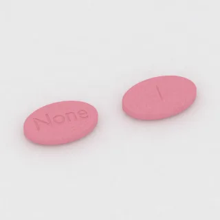 Albendazol 400 mg Tablette: rosa, oval, 19 mm, mit Bruchkerbe, Prägung None.
