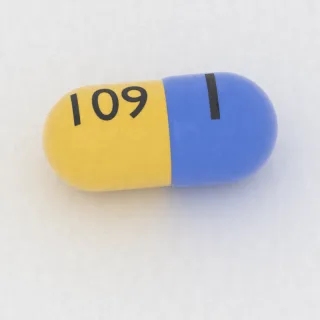 Atomoxetine 60 mg capsule: blue and yellow, 18 mm, imprinted I on one side and 109 on the other.