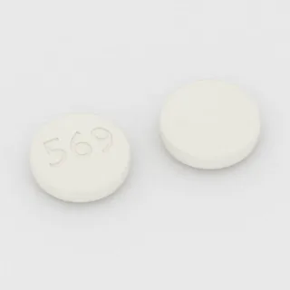 Akamprozat 333 mg, tabletka: biała, okrągła, 10 mm, z oznaczeniem 569.