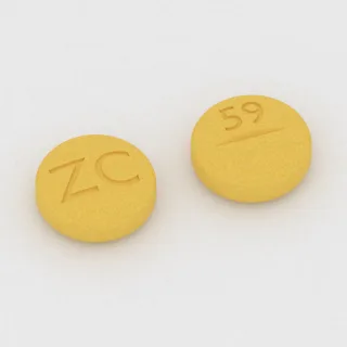 Azatiopryna 50 mg, tabletka: żółta, okrągła, 8 mm, z linią podziału, z oznaczeniem ZC po jednej stronie i 59 po drugiej.