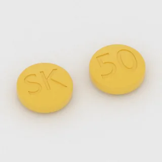 Cenobamate 50 mg tablet: yellow, round, 10 mm, imprinted SK on one side and 50 on the other.