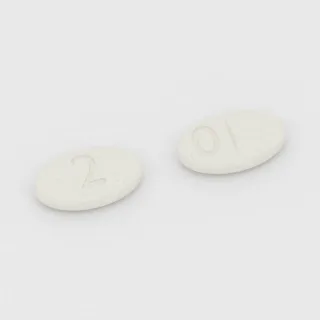 Tablet Klobazam 20 mg: putih, oval, 11 mm, bergaris bagi, dengan kode cetak 2 di satu sisi dan 0 di sisi lainnya.