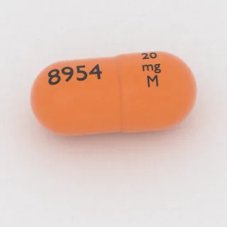 Amphetamine and dextroamphetamine 5 mg / 5 mg / 5 mg / 5 mg capsule: orange and orange, 18 mm, imprinted 20 mg M 8954.