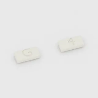 Cetirizin 10 mg Tablette: weiß, rechteckig, 9 mm, Prägung G auf der einen Seite und 4 auf der anderen.