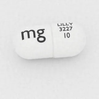 Atomoxetin 10 mg Kapsel: weiß, 16 mm, Prägung LILLY 3227 10 mg.