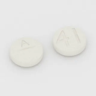 Tablet Klomifen 50 mg: putih, bulat, 9 mm, bergaris bagi, dengan kode cetak A di satu sisi dan 41 di sisi lainnya.