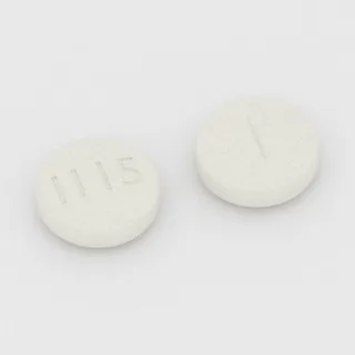बैक्लोफेन 20 mg टैबलेट: सफ़ेद, गोल, 11 mm, विभाजन रेखा सहित, इम्प्रिंट I115।