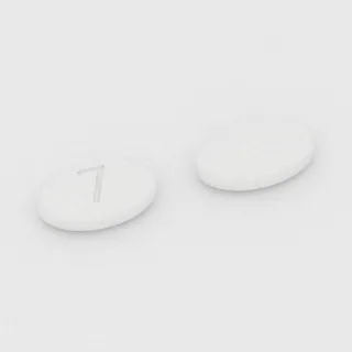 Buprenorfin ve nalokson 0.7 mg / 0.18 mg tablet: beyaz, oval, 7 mm, üzerinde 7 baskısı var.