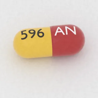 Kwas acetylosalicylowy + dipirydamol 25 mg / 200 mg, kapsułka: czerwona i żółta, 23 mm, z oznaczeniem AN po jednej stronie i 596 po drugiej.