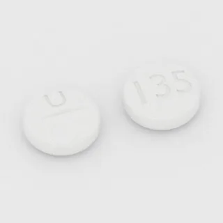 Clonidine 0.1 mg tablet: white, round, 8 mm, scored, imprinted U on one side and 135 on the other.