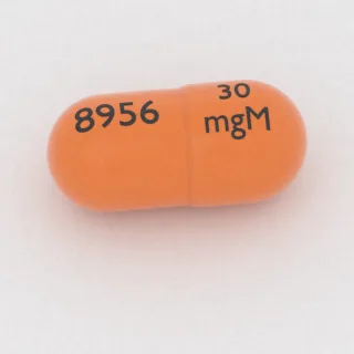 Amphetamine and dextroamphetamine 7.5 mg / 7.5 mg / 7.5 mg / 7.5 mg capsule: orange, 19 mm, imprinted 30 mgM 8956.