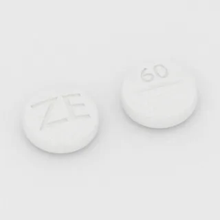 Kandesartan 16 mg tablet: beyaz, yuvarlak, 7 mm, çentikli, bir yüzünde ZE, diğer yüzünde 60 baskısı var.
