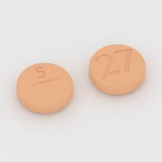 Bumetanid 2 mg Tablette: orange, rund, 10 mm, mit Bruchkerbe, Prägung 5 auf der einen Seite und 27 auf der anderen.