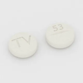 Buspirone 5 mg tablet: white, round, 6 mm, scored, imprinted TV on one side and 53 on the other.