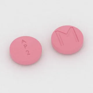 Atovaquone and proguanil 250 mg / 100 mg tablet: pink, round, 11 mm, imprinted A P 2 M.