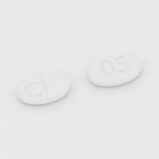 قرص كابرغولين 0.5 mg: أبيض، بيضاوي، 8 مم، محزّز، النقش c على أحد الوجهين و05 على الوجه الآخر.