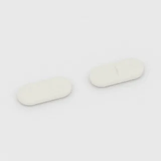 قرص سيفالكسين 250 mg: أبيض، على شكل كبسولة، 13 مم، محزّز، بلا نقش.