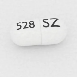كبسولة أبريبيتانت 80 mg: أبيض وأبيض، 18 مم، النقش SZ على أحد الوجهين و528 على الوجه الآخر.