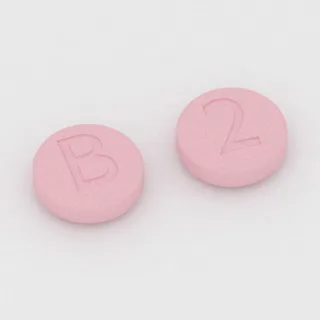 Bumetanid 2 mg Tablette: rosa, rund, 11 mm, Prägung B auf der einen Seite und 2 auf der anderen.