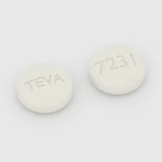 Cilostazol 100 mg tablet: white, round, 8 mm, imprinted TEVA on one side and 7231 on the other.
