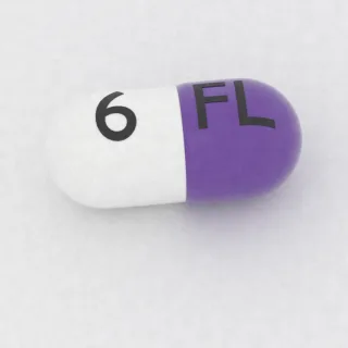 Cariprazin 6 mg Kapsel: violett und weiß, 16 mm, Prägung FL auf der einen Seite und 6 auf der anderen.