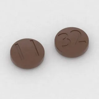 Klorpromazin 100 mg tablet: kahverengi, yuvarlak, 10 mm, bir yüzünde 11, diğer yüzünde 32 baskısı var.