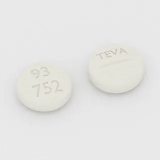 Atenolol 50 mg tablet: white, round, 7 mm, scored, imprinted 93 752 TEVA.