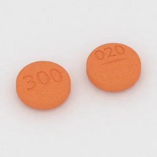 Allopurinol 300 mg tablet: orange, round, 11 mm, scored, imprinted 300 on one side and 020 on the other.
