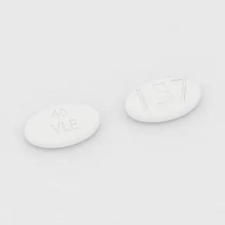 Tablet Atorvastatin 40 mg: putih, oval, 15 mm, dengan kode cetak 40 VLE 157.
