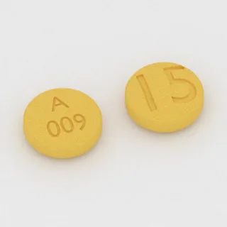Aripiprazol 15 mg tablet: sarı, yuvarlak, 6 mm, üzerinde A 009 15 baskısı var.