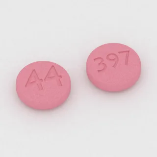 Aspirin 81 mg tablet: pink, round, 8 mm, imprinted 44 on one side and 397 on the other.