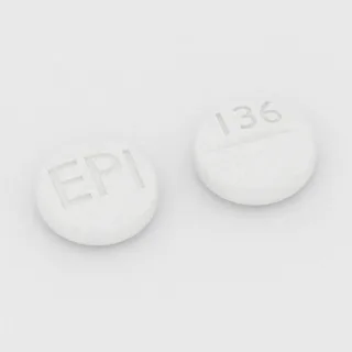 Benztropine 0.5 mg tablet: white, round, 6 mm, scored, imprinted EPI on one side and 136 on the other.