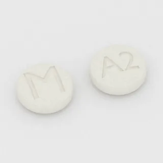 Atenolol 25 mg tablet: white, round, 6 mm, imprinted M on one side and A2 on the other.