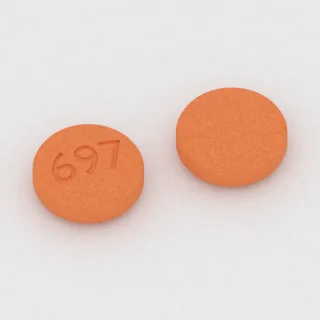 Benazepril 10 mg tablet: orange, round, 8 mm, imprinted 697.