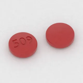 Chlorpromazine 10 mg tablet: red, round, 8 mm, imprinted 509.