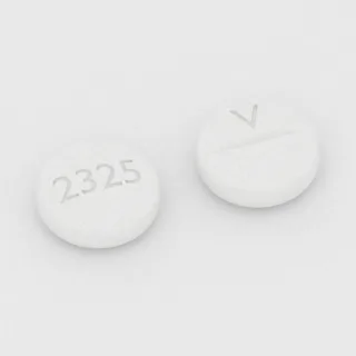 Benztropin 0.5 mg tablet: beyaz, yuvarlak, 6 mm, çentikli, bir yüzünde 2325, diğer yüzünde V baskısı var.