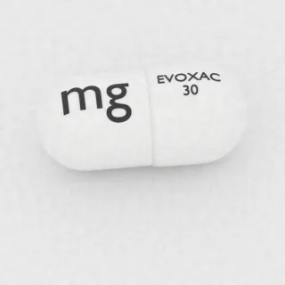 सेविमेलिन 30 mg कैप्सूल: सफ़ेद, 15 mm, इम्प्रिंट EVOXAC 30 mg।