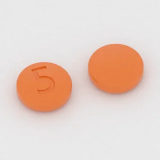 बिसाकोडिल 5 mg टैबलेट: नारंगी, गोल, 6 mm, इम्प्रिंट 5।