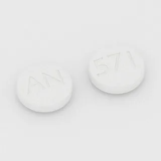 Betanecol 5 mg em comprimido: branco, redondo, 11 mm, com a gravação AN de um lado e 571 do outro.