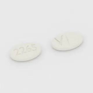 Baclofen 10 mg Tablette: weiß, oval, 11 mm, mit Bruchkerbe, Prägung 2265 auf der einen Seite und V auf der anderen.