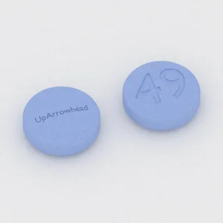 Carbidopa and levodopa 25 mg / 250 mg tablet: blue, round, 11 mm, imprinted UpArrowhead on one side and 49 on the other.