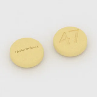 Carbidopa and levodopa 25 mg / 100 mg tablet: yellow, round, 8 mm, imprinted UpArrowhead on one side and 47 on the other.