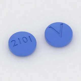 Amitriptilina, tableta de 10 mg: azul, redonda, 6 mm, con la inscripción 2101 en una cara y V en la otra.