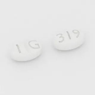 Benztropine 1 mg tablet: white, oval, 4 mm, scored, imprinted IG on one side and 319 on the other.