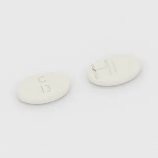 Tablet Klobazam 20 mg: putih, oval, 11 mm, bergaris bagi, dengan kode cetak C 13 H.