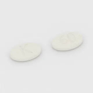 Armodafinil 250 mg tablet: white, oval, 16 mm, imprinted K on one side and 60 on the other.
