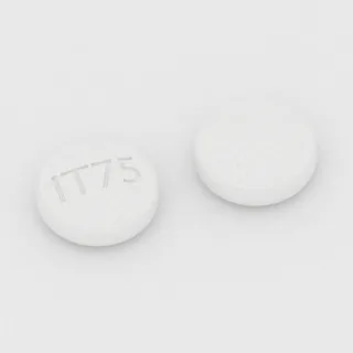 Amantadyna 100 mg, tabletka: biała, okrągła, 7 mm, z oznaczeniem IT75.