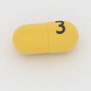 كبسولة بنزوناتات 200 mg: أصفر، 8 مم، النقش 3.