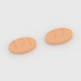 Capecitabin 500 mg Tablette: orange, oval, 16 mm, Prägung 191 auf der einen Seite und 77 auf der anderen.