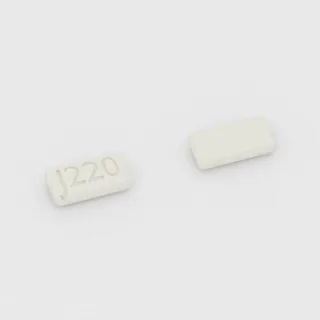 Cetirizin 10 mg Tablette: weiß, rechteckig, 9 mm, Prägung J220.
